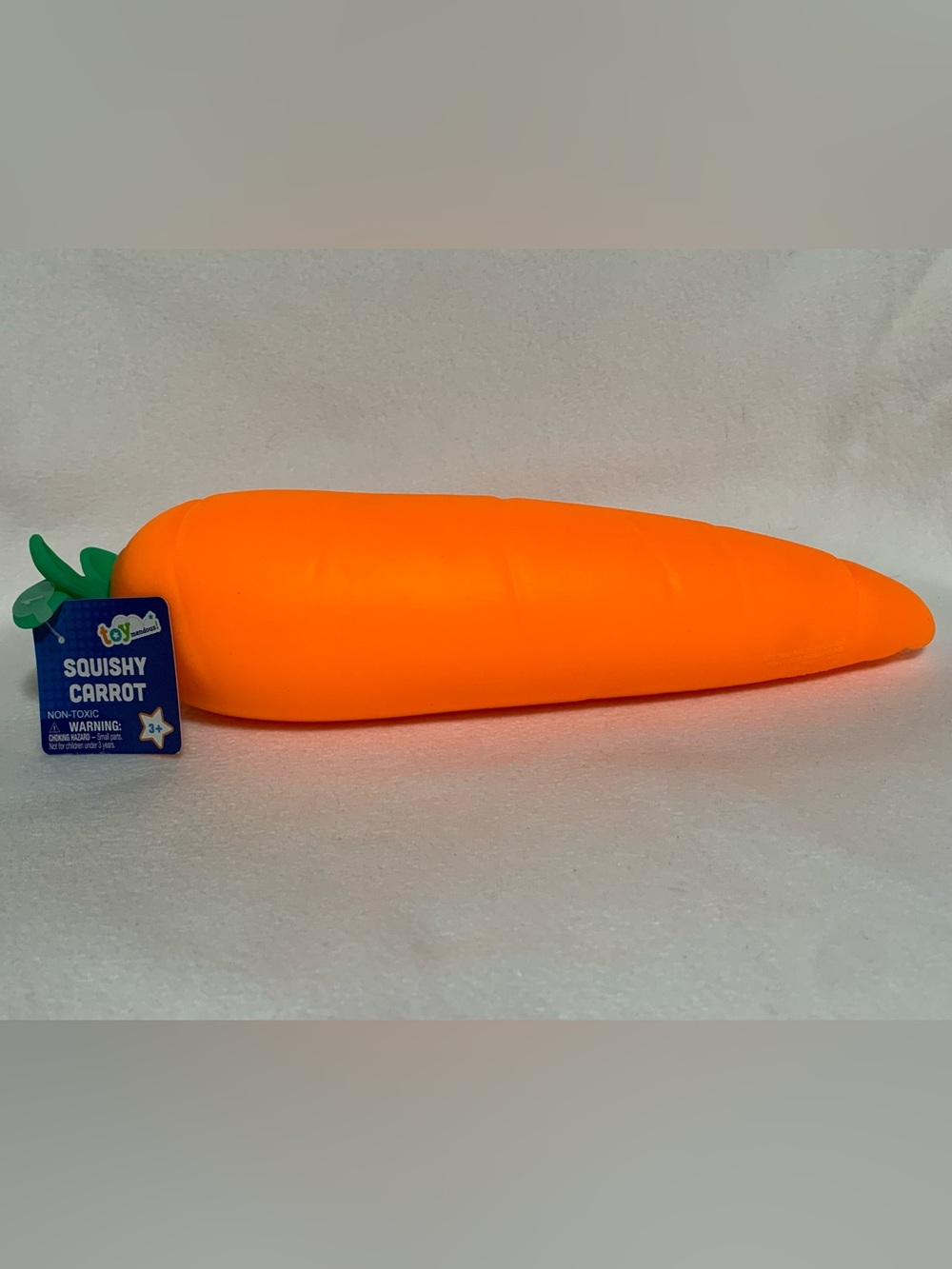 Squishy Orange Carrot Toy for Kids by Tom Mendous